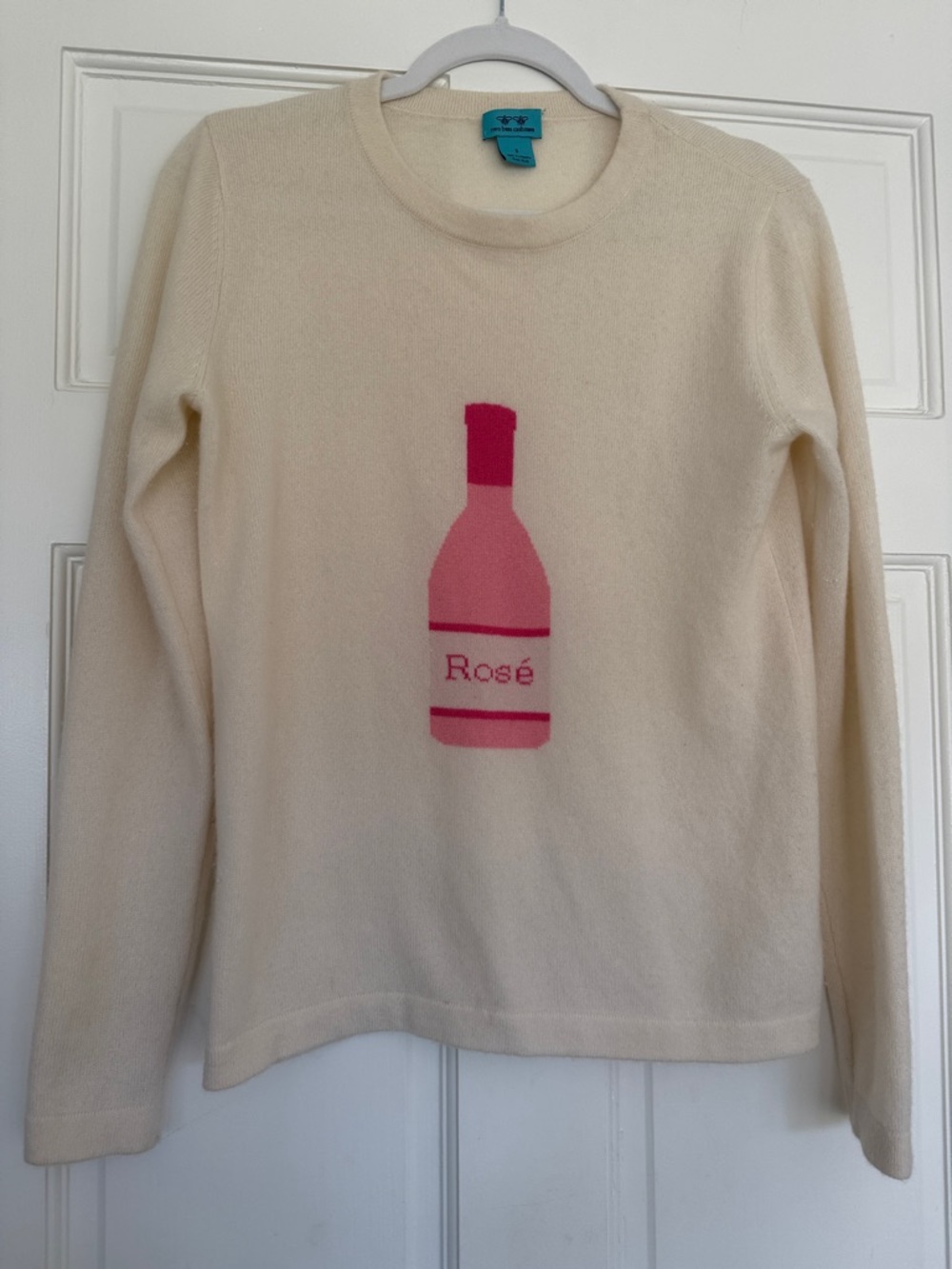 Two Bees Cashmere Cream Crewneck Sweater with Pink Rosé Bottle Graphic